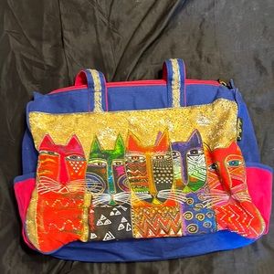New never used Laurel Burch tote. Cat motif  has been in my closet for a few .